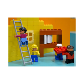 Lego figures building lego house