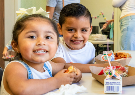 Photos of two children smiling at the camera